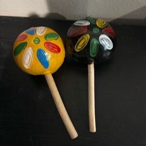 Vintage maracas made of guards and hand painted.